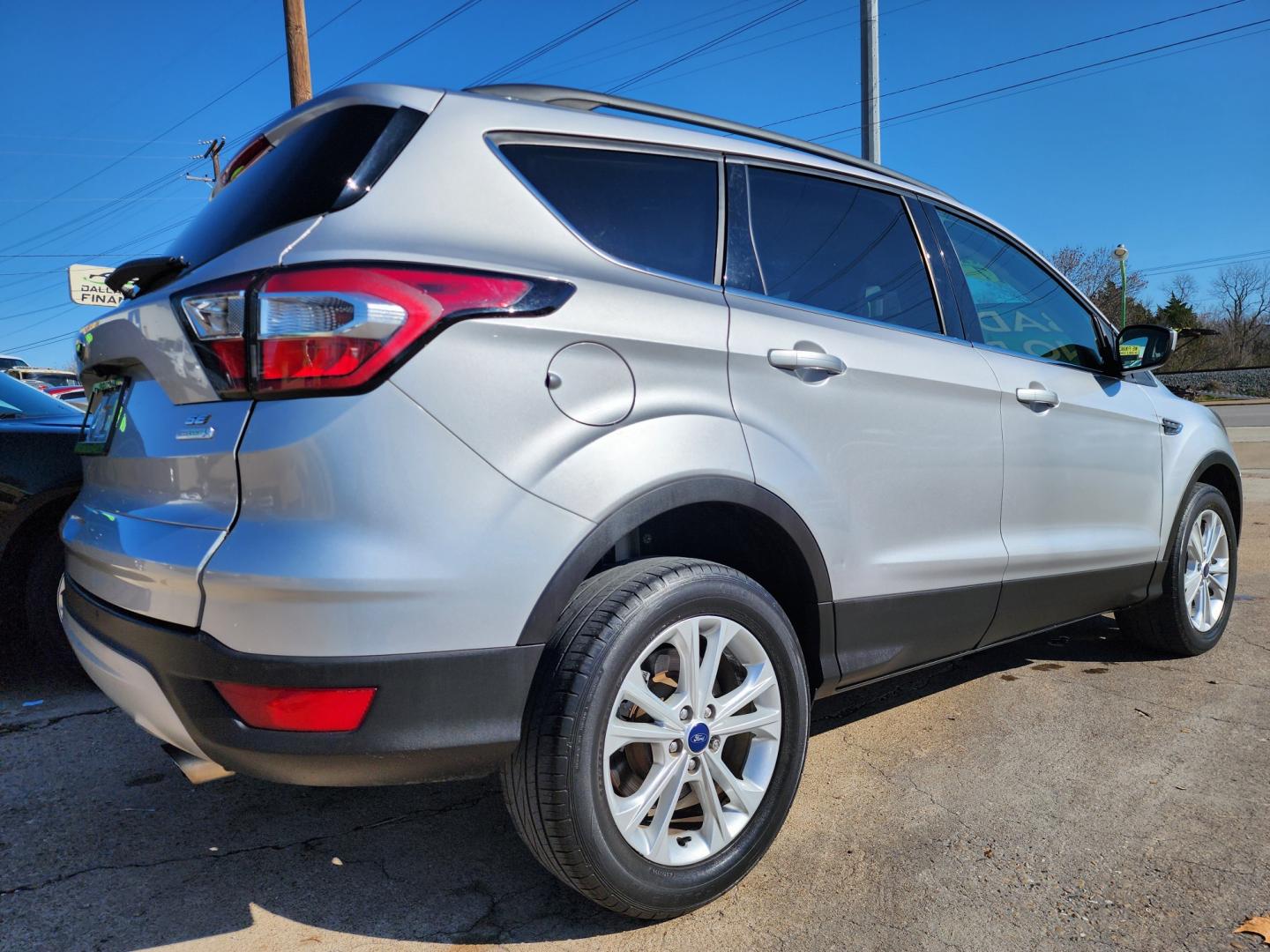 2017 SILVER Ford Escape SE (1FMCU0GD3HU) with an 1.5L L4 DOHC 16V engine, 6A transmission, located at 2660 S.Garland Avenue, Garland, TX, 75041, (469) 298-3118, 32.885551, -96.655602 - Welcome to DallasAutos4Less, one of the Premier BUY HERE PAY HERE Dealers in the North Dallas Area. We specialize in financing to people with NO CREDIT or BAD CREDIT. We need proof of income, proof of residence, and a ID. Come buy your new car from us today!! This is a Super Clean 2017 FORD ESCAP - Photo#3